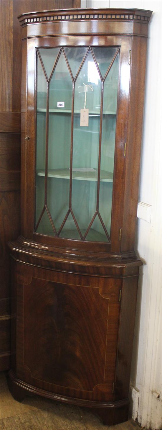 Inlaid mahogany shape-fronted corner cabinet with astragal-glazed door